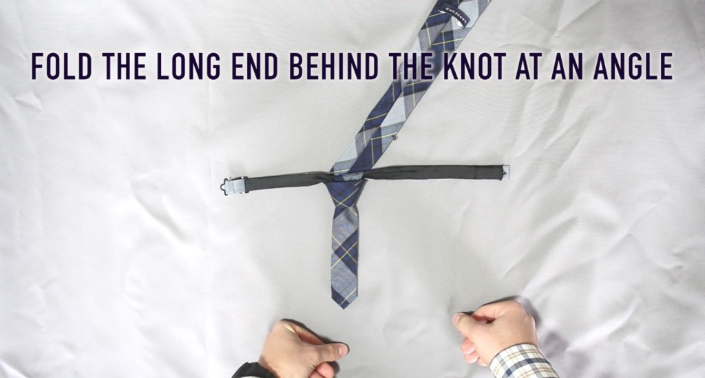 Fold the Long End Behind the Knot at an Angle