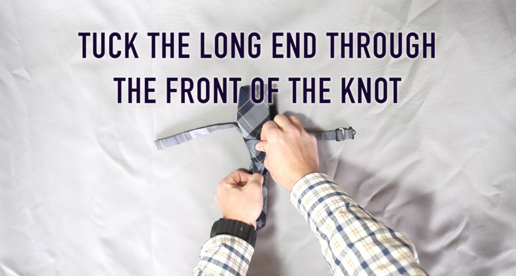 Tuck the Long End Through the Front of the Knot